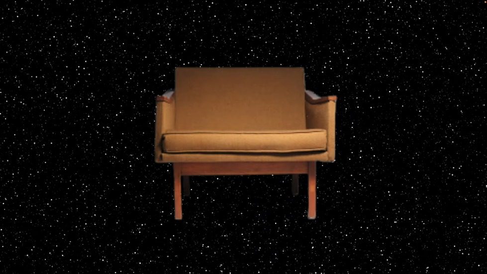 A brown chair in space Description automatically generated